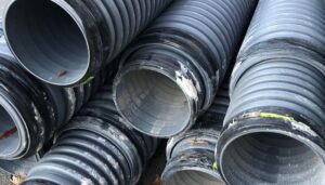 Dry well French drain outlet system that will install in a flat backyard
