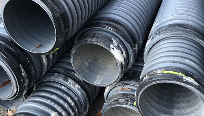 Dry well French drain outlet system that will install in a flat backyard